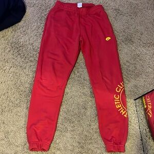 nike sweatpants really good condition! One faded line on the back, not a stain.